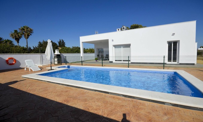 Conil de la Frontera Ski Chalet | MAGNIFICENT DESIGN VILLA WITH BIG EXCLUSIVE SWIMMING POOL AND GARDEN