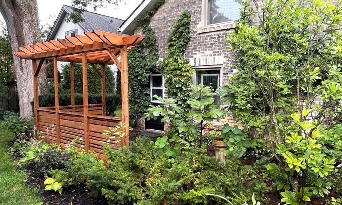 Exhibition Park House | Magnificent 1867 Coach House, private patio, 2 minute walk to downtown
