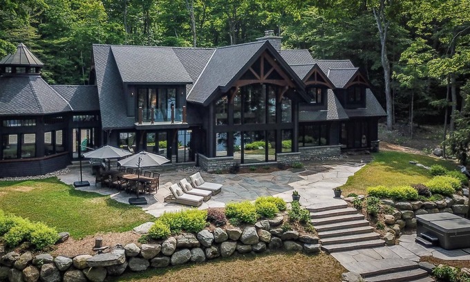 Seguin Cottage | Magnificent 6bdrm 8bath luxury on Lake Joe! Hot Tub! Gym! Boathouse!