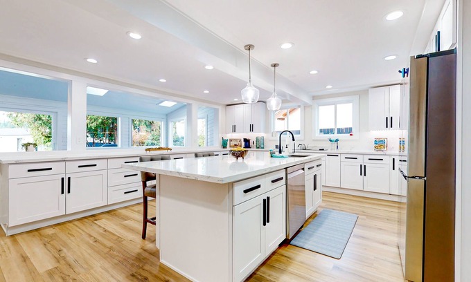 Bonney Lake House | Magnificent & illuminated lakefront villa with fire pit, patio, & amazing views