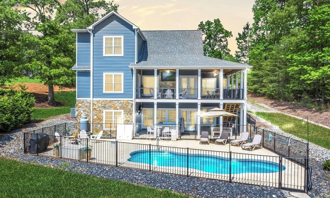 Moneta House | Magnolia Cove, New Lakefront Luxury w/Covered Decks + Heated Salt Water Pool, Fire Pit & Dock!