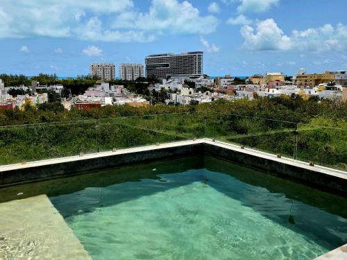 Jimenez Apartment | Mangle 13 Modern Apartments-Rooftop pool, close to Ferry