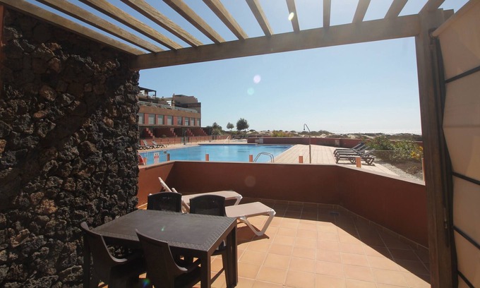 Los Lagos Apartment | Marfolin 1 El Cotillo. Beachfront apartment with direct access to pool & beach