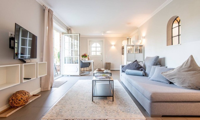 Archsum Apartment | Marie - Garden Suite - Garden. Nature. Stylish.