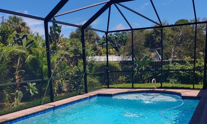 Tropic Apartment | Master bedroom suite with pool. Eight minutes to beaches.
