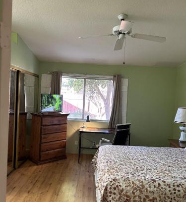 Hemet House | Meadow Harvest Suite with TV and private bathroom