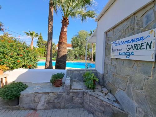 Kiti House | Mediterranean poolside garden cottage
