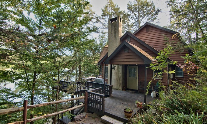 Greentown Ski Chalet | Michael's Big Woods Lakefront Chalet with WIFI, AC and water toys