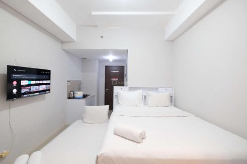 Bekasi Timur Apartment | Minimalist Studio Transpark Juanda Bekasi Timur Apartment By Travelio