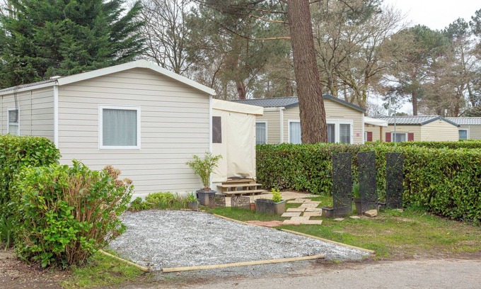Pont-Aven RV Rental | Mobile Home 'Tout Confort Bora Bora' with Shared Pool, Private Terrace and Private Garden