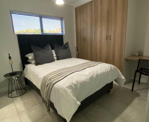 Boksburg Apartment | Modern 1BR Near OR Tambo, Wi-Fi, Secure Parking