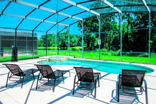 Watersong Villa | Modern 5 Bed4.5 Bath PoolSpa Villa in Watersong