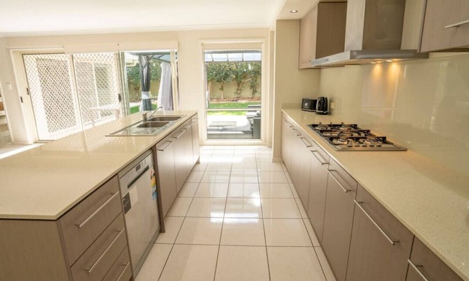 Biggera Waters House | Modern 5 Bedroom Home