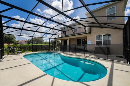 Davenport House | Modern 5BD, 4BA pool home in a golf resort community of Providence
