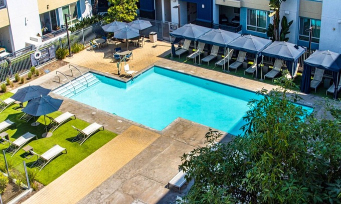 Platinum Triangle Apartment | Modern Anaheim Retreat By Disney- Pool, Gym, WiFi, Outdoor Areas and More