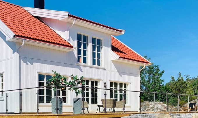 Risor House | Modern and comfortable cottage with very spacious wooden terrace.