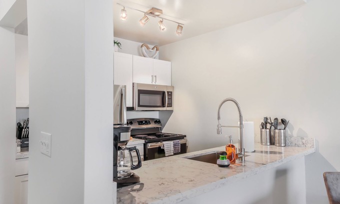 Northville Apartment | Modern and Serene 2 Bedroom Lake View Gem