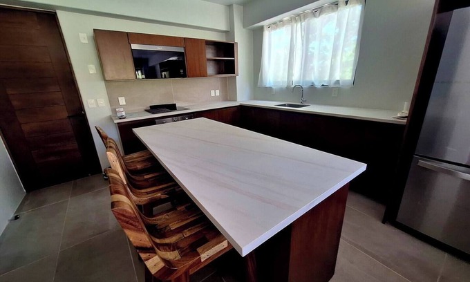 P Chahue Apartment | Modern Apt with Pool - 5 Min walk to Chahue Beach