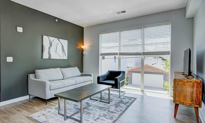 Fountain Square Apartment | Modern Chic 2 BR w Free Garage Parking by Stay Gia
