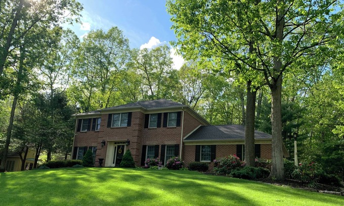 Park Forest Village House | Modern colonial home with hot tub and fire pit close to Penn State