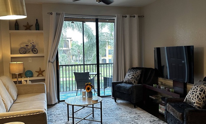 Sarasota Condo | Modern condo in resort style gated community with large pool, gym, tennis, bbq.