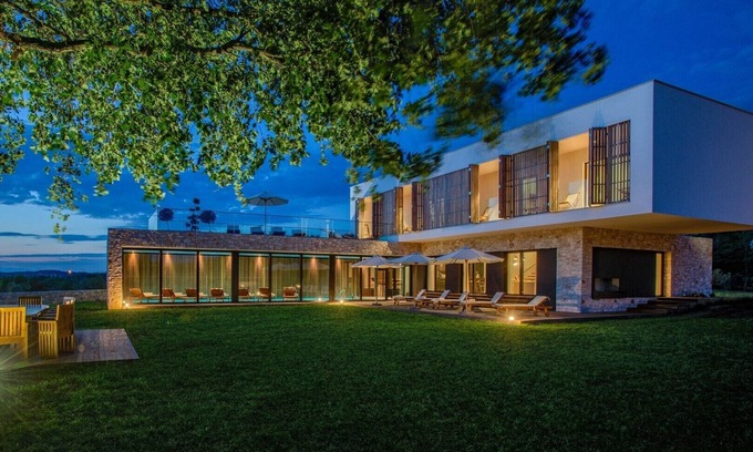 Porec Villa | Modern-designed villa with indoor-outdoor pool in Istria surrounded by nature on a large property which ensures privacy.