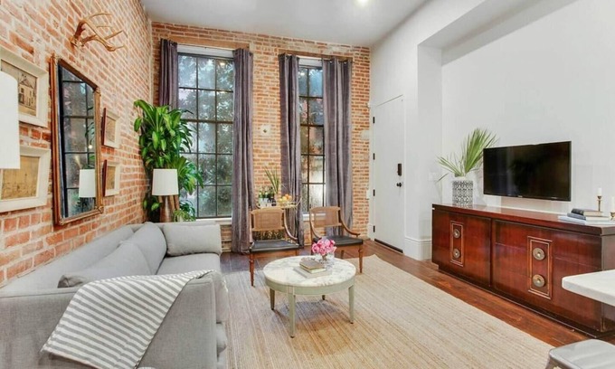 Central Business District Hotel | Modern Luxury in NOLA: 4BR, 4BA Downtown Suite - Close to Harrah's & French Quarter