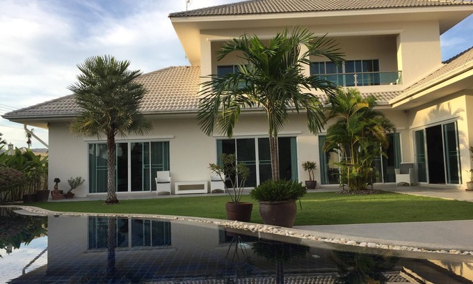Ban Nong Sadao Villa | Modern luxury villa with large saltwater pool, jacuzzi and tropical garden