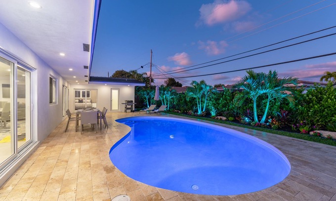 Imperial Point House | Modern Oasis, Heated Pool, Short Drive to Beach