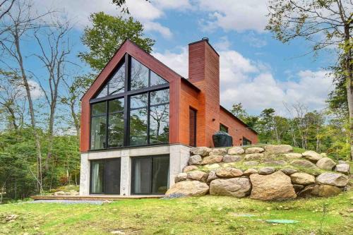 Lac Superieur Village Ski Chalet | Modern Scandinavian Chalet with Jacuzzi, Pool, Lake