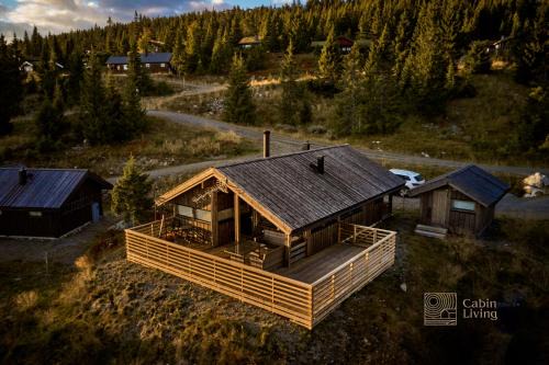 Ringsaker House | Modern sports cabin on Sjusjøen with sauna and waxing room