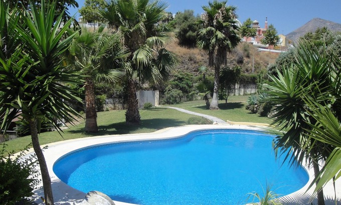 Benalmadena Costa Ski Chalet | Modern terraced house 650 m from the beach. Communal swimming pool. a / c