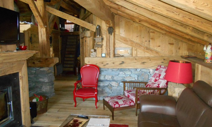 La Cote-dʼAime Apartment | Mountain Dream, warm cocoon of old wood welcoming and cozy.