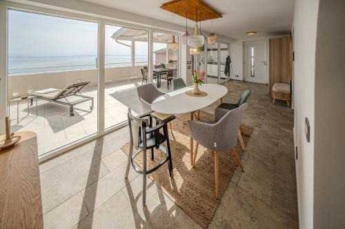 Bregi Apartment | Nachhaltige Wellnessauszeit mit Traumblick, Pool, Sauna, Whirl-Wanne
