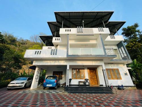 Anachal House | Nandana's Residency Munnar - A 4BHK Homestay for Indian Families