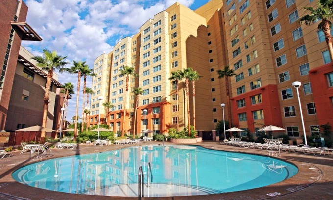 Enterprise Condo | National Finals RODEO- 1-BD Condo- Full Kitchen- In-suite Laundry, FREE Parking