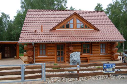 Trassenheide Apartment | Naturstamm Ferienhaus