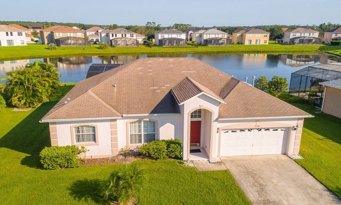Crescent Lakes House | Near Disney Luxury Lakeside Villa with Spa and Wireless Internet