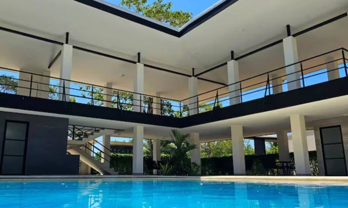 Tambor Apartment | New 2 Br + Patio Condo, steps to private beach