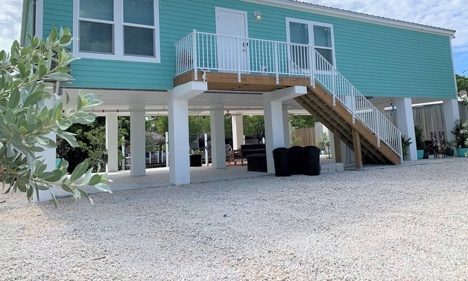 Key West House | New-build, luxury canal front home w/ dock, firepit, micro pool
