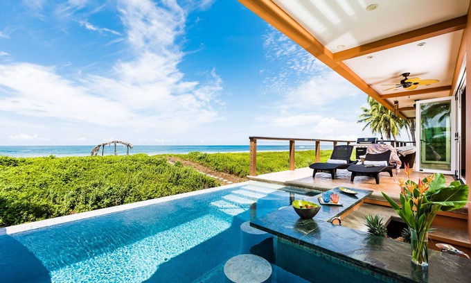 Junquillal House | NEW CASTLE HOME ON THE BEACH,2 Pools,WATERSLIDE & WATERFALL!Includes Housekeepin
