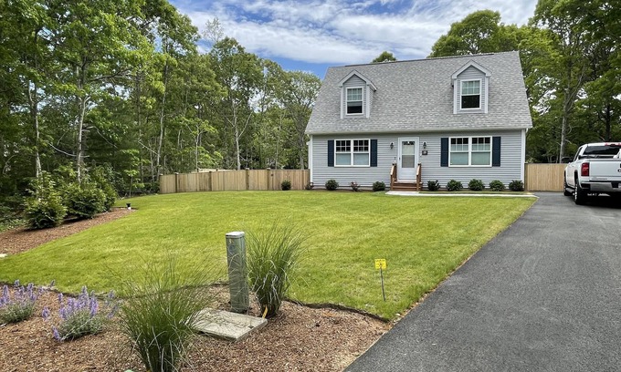 East Dennis House | New construction cape house close to shops and 3 miles from the beach .