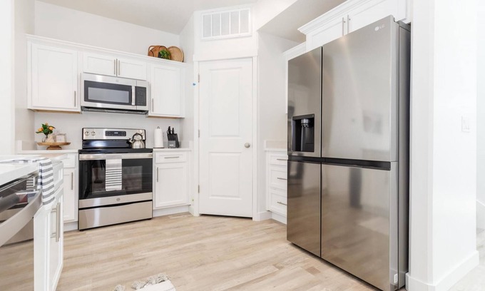Garden City Villa | New Designer Townhome w Trailer Parking Games