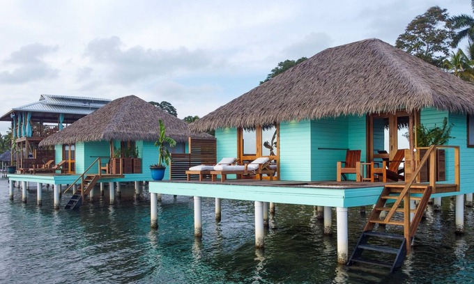 Isla Solarte Bed & Breakfast | (NEW!) Entire Exclusive Overwater Bungalow B&B - Glass Floors, Free Breakfast