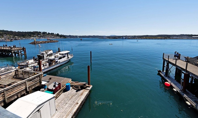 Historic Bayfront Apartment | New listing! Waterfront lodge studio w/ fireplace & balcony - on the Bayfront!