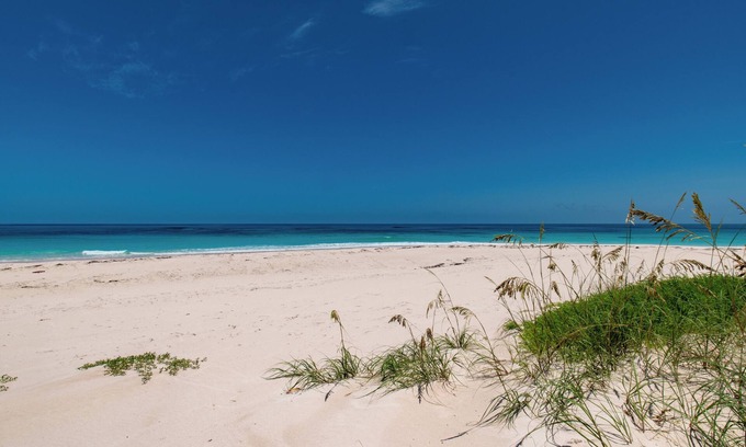 Governor's Harbour House | New Luxury Beachfront Bungalows w/Heated Pool, Pink-Sand Beach