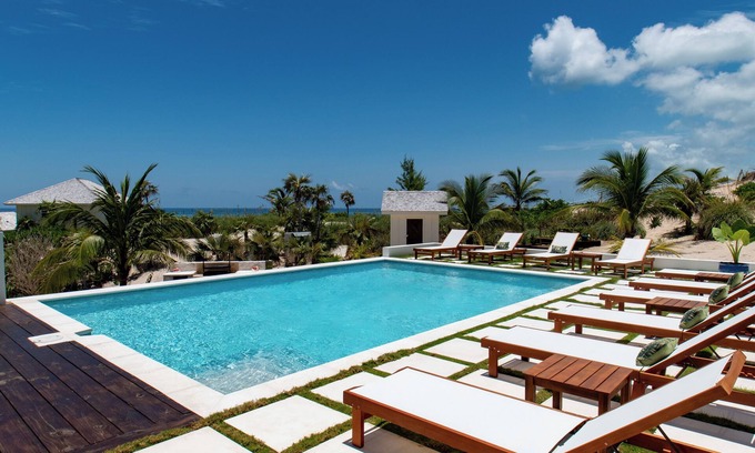 Governor's Harbour House | New Luxury Beachfront Bungalows w/Heated Pool, Pink-Sand Beach