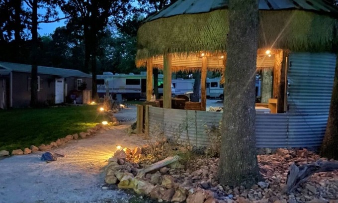 Grove Resort | New modern cabin on a beautiful shaded property across from Honey Creek Bridge.