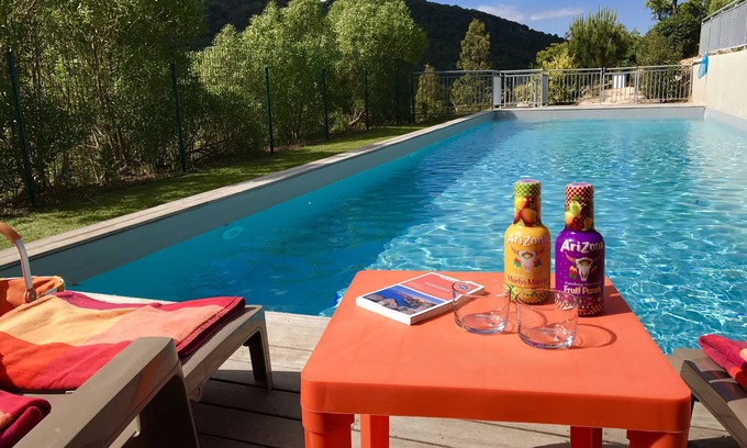 Santa Giulia House | New, modern stone chalet with large terrace and large pool (Rondinara)