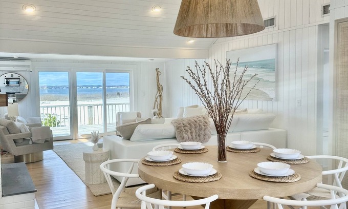 West Hampton Dunes House | NEW TO MARKET! Stunning Dune Road bay front, steps to private ocean access!